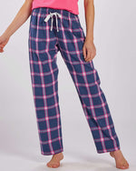 Model wearing Navy and pink flannel pants 