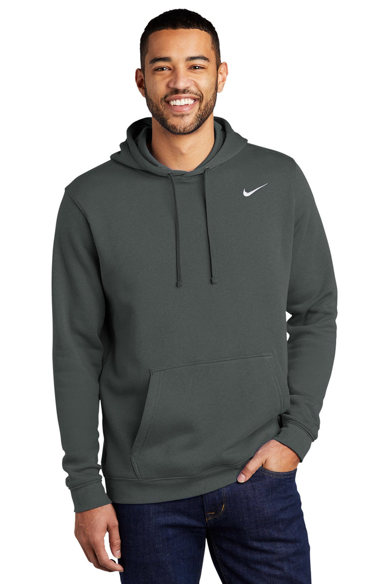 Male model wearing K-state Nike Hooded Sweatshirt.  Grey sweatshirt with jeans