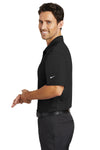 Male model wearing Black Nike K-state Polo - side view