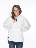 Female model wearing white windbreaker