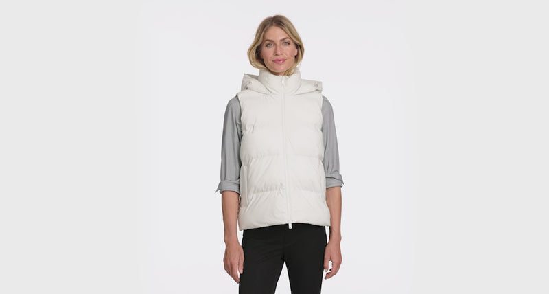 famale model showing white puffer vest